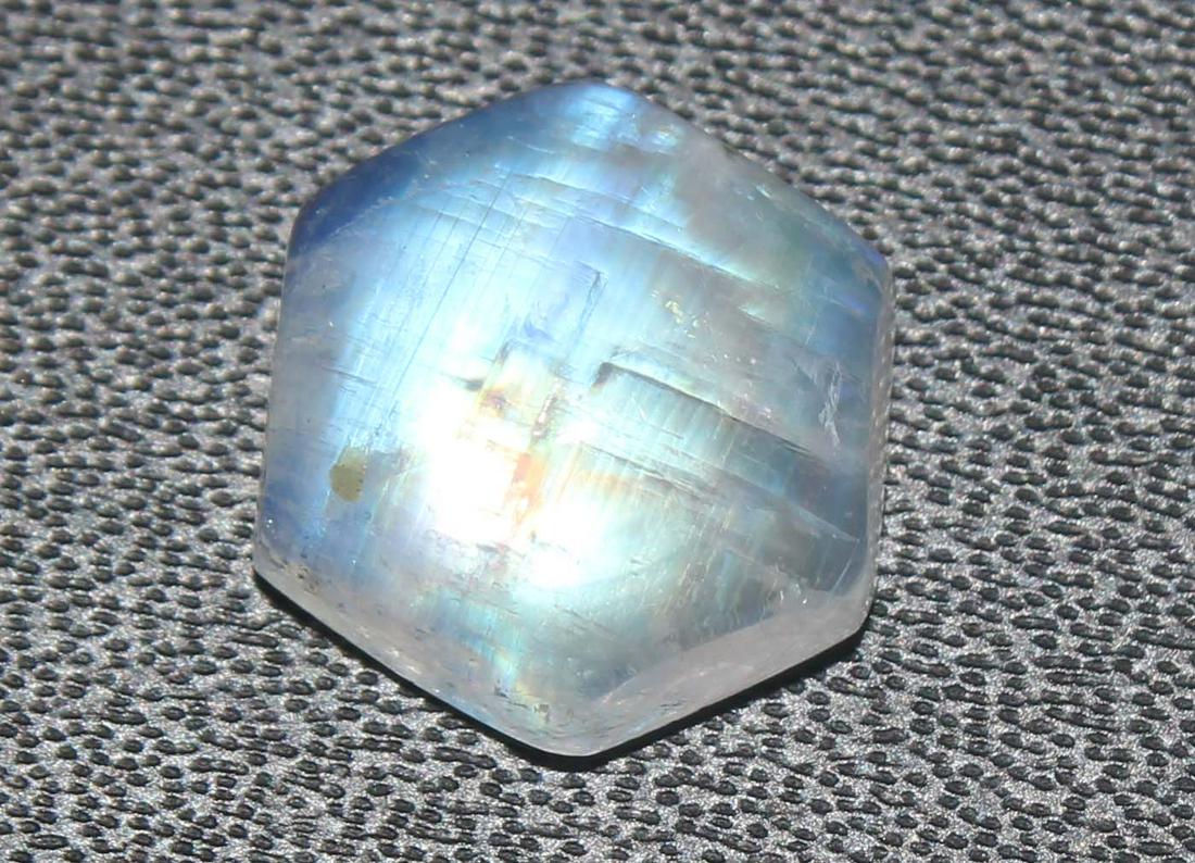 6.56 Cts Natural Rainbow Moonstone: No Reserve! Gemstone : Natural Rainbow Moonstone Shape and cut : Hexagon Cabochan Weight : 6.56 Carats Measurements : 12.07x11.74x5.50 mm Color : Colourless Transprancy : Transparent Treatment : No Tr
