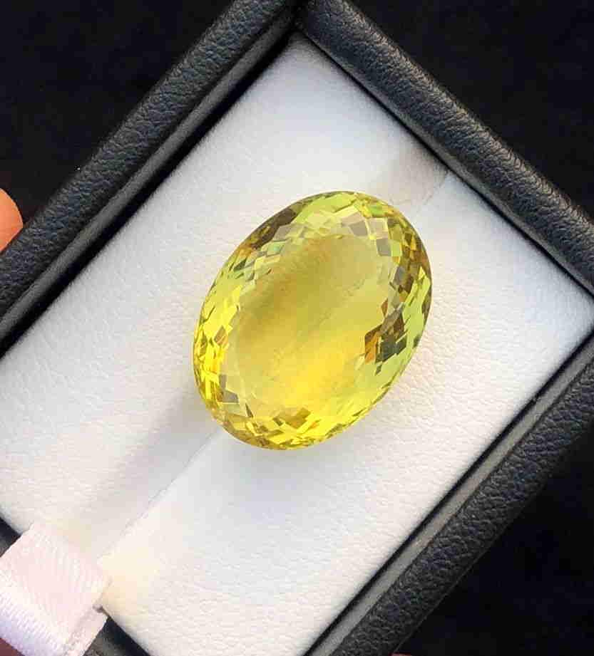 20.5 Carats Natural Lemon Quartz: Title: 20.5 Carats Natural Lemon Quartz Gemstone: Lemon Quartz Carat Weights: 20.5 Carats Size/Dimensions: 20x15x10 MM Additional Info: Natural Reserve: $60.00 Shipping: Domestic: Flat-rate of $1