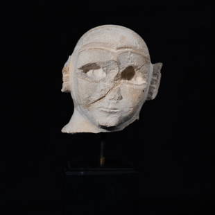 Sumerian, Mesopotamian Limestone male head, Early: Title: Sumerian, Mesopotamian Limestone male head, Early Dynastic IIIb period, circa 2500-2250 BCEDescription: Shaven male head, with large almond-shaped eyes and arched eyebrows prepared to contain