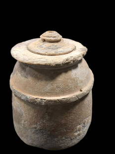 Assyrian Stone lidded jar, circa 2000 BC: Title: Assyrian Stone lidded jar, circa 2000 BCDescription: This jar was probably intended to contain incense or ointments, given its small size and detailed carving. These small stone objects are