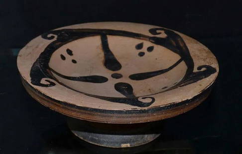 AN ETRUSCAN TERRACOTTA STAR DISH, 4th CENTURY B.C.: Ancient Etruscan stemmed dish, possibly from ancient Caere, belongs to the Gemulicia Group. Buff colored dish with decorated spaced wave pattern and a triple-dot cluster in each quadrant. 4th century