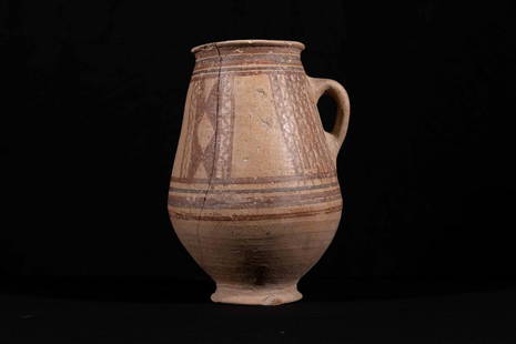 Holy Land (Canaanite) Terracotta bichromatic pitcher,: Title: Holy Land (Canaanite) Terracotta bichromatic pitcher, Late Bronze, 1550-1400 B.C.Description: This jug features geometric decoration based on lines that create grids, giving rise to a