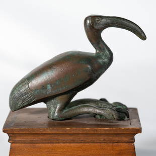 Ancient Egypt Bronze Ibis with engravings, Ptolemaic: Title: Ancient Egypt Bronze Ibis with engravings, Ptolemaic Period, Circa 3rd Century BCDescription: Ibis are birds considered sacred in Ancient Egypt, as they were assimilated to the god Thoth, the