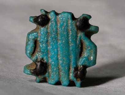 Ancient Egypt Faience green glazed multiple Wedjat: Title: Ancient Egypt Faience green glazed multiple Wedjat amulet, Third Intermediate Period, 21st-25th Dynasties -EX-PIERRE BERGÃ‰ Size: 1.4 cm Description: This multiple udjat eye amulet, pierced