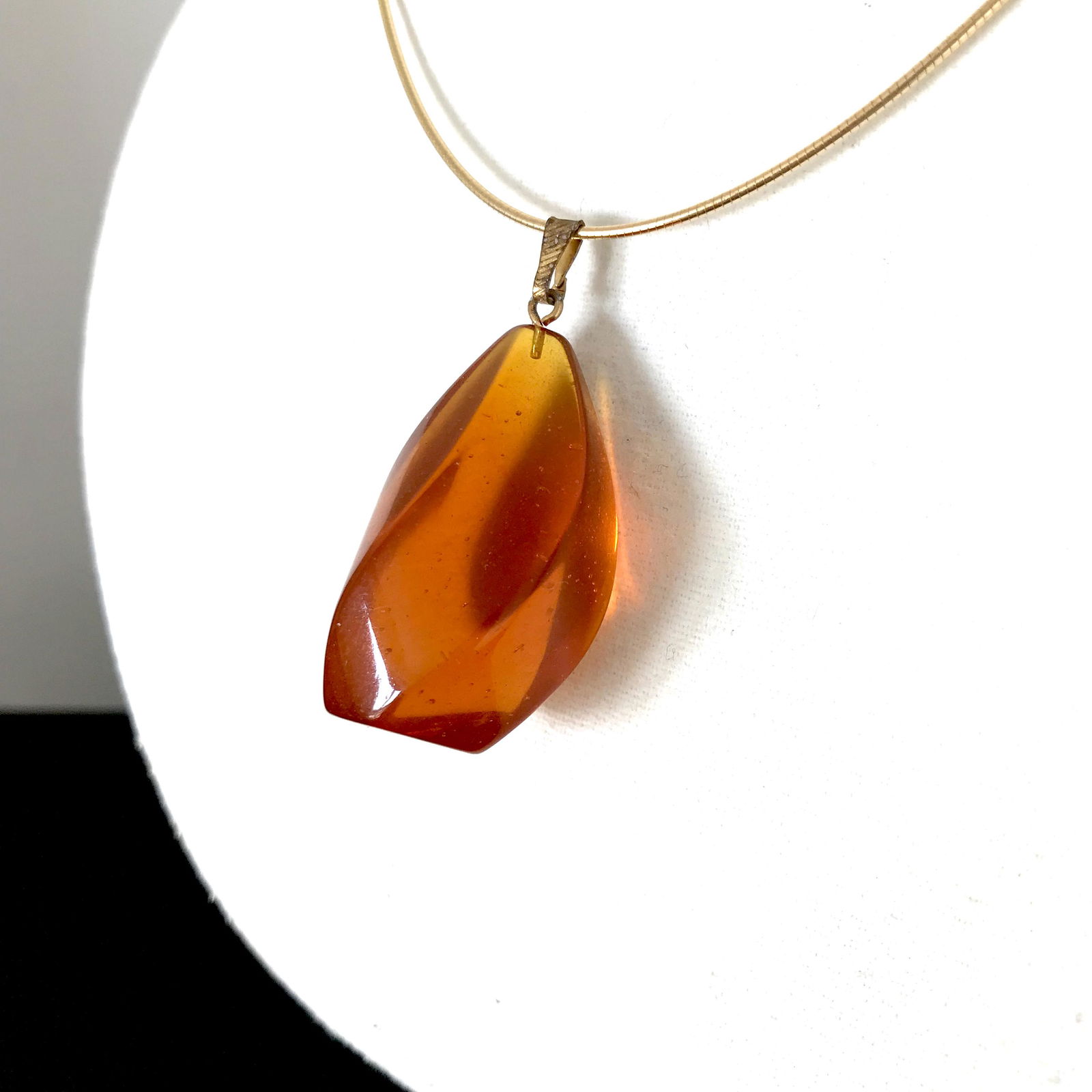 Unique and Extraordinary Amber Pendant shaped like an (1 of 8)