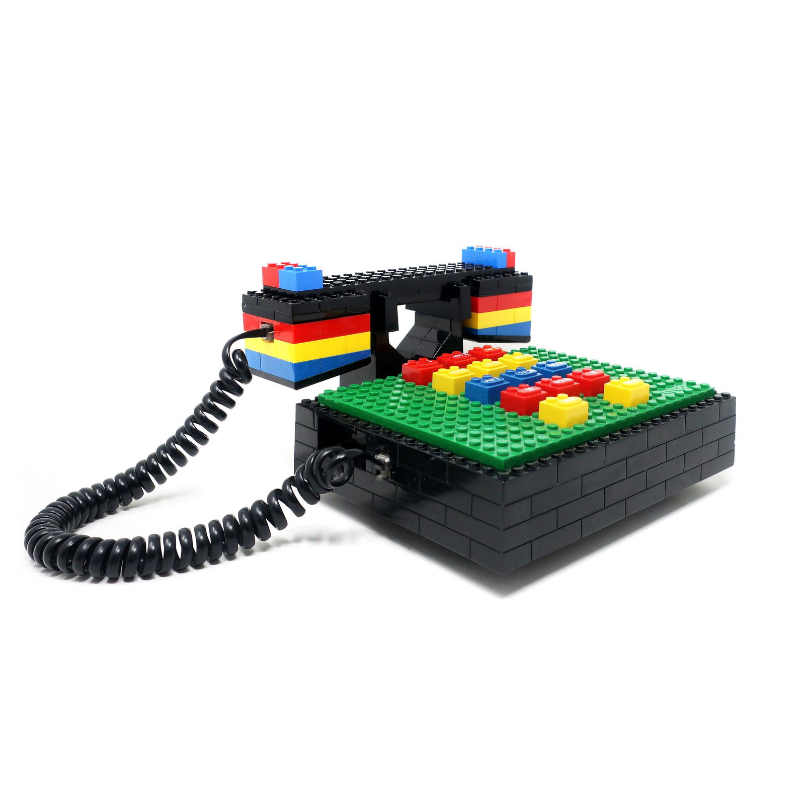 1980s Lego Super Blocks Telephone: A fantastically fun Lego telephone made by Tyco in the late 1980s. Works great and includes a handful of spare Lego pieces in the phone side drawer - also a great place to stash a pen and paper for ta