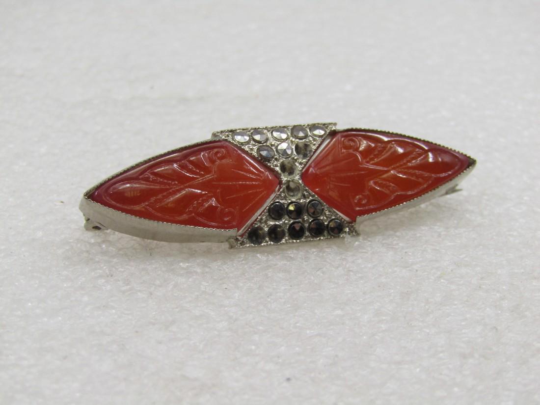 Vintage Art Deco Carnelian Marcasite Brooch, Pointed 2": Vintage Art Deco Carnelian Marcasite Brooch, Pointed 2" by 5/8". Cat-eye shaped with a triangle of marcasites on ech center piece and etched carnelian. The pin is a silver tone metal that stays bright