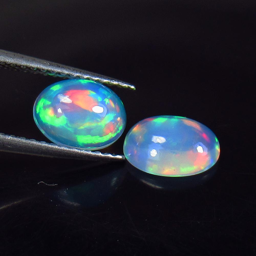 1.57 Ct Natural Ethiopian Multicolor Opal Oval Pair (1 of 2)