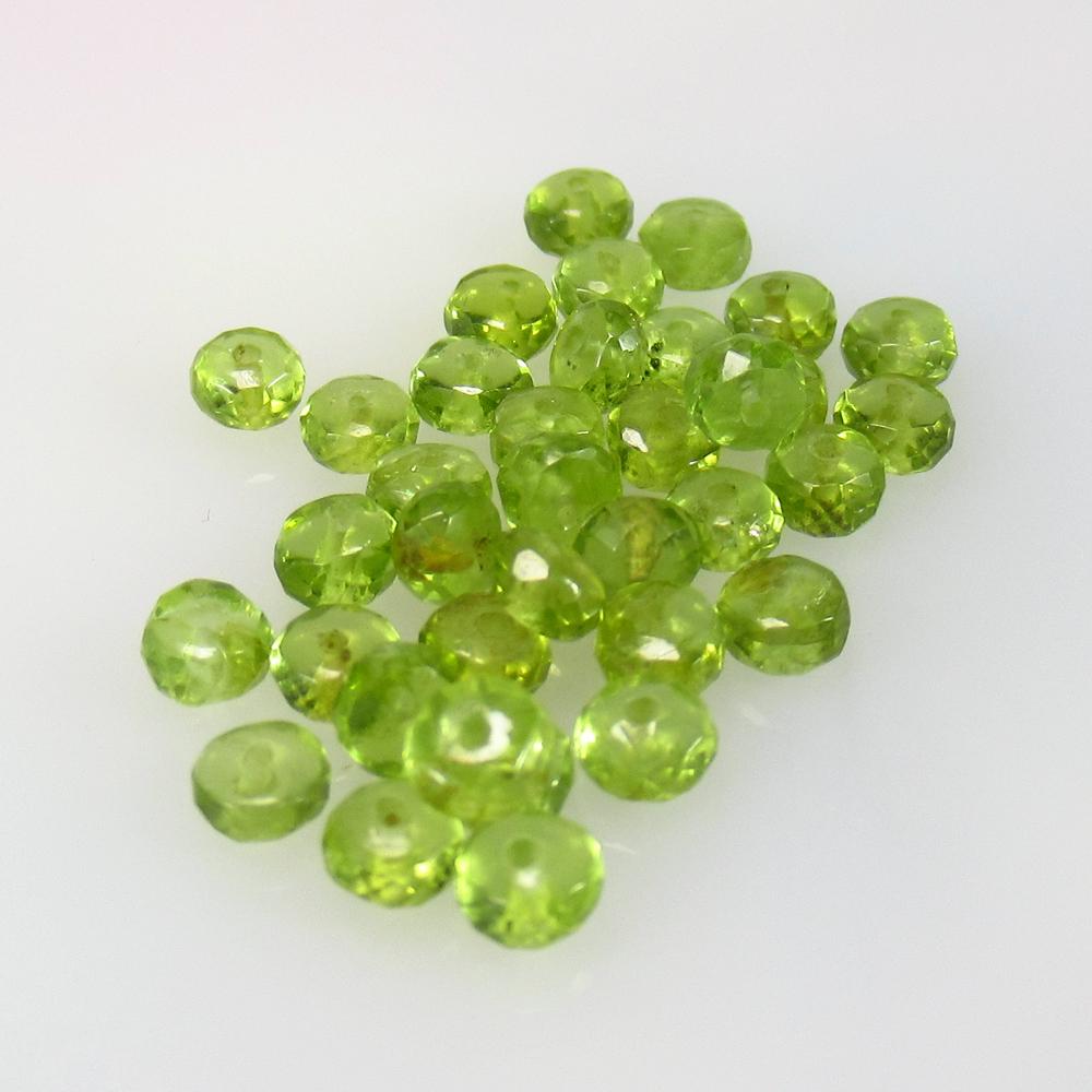 10.87 Ct Natural 36 Pakistan Peridot Drilled Round: No Reserve! Title: 10.87 Ct Natural 36 Pakistan Peridot Drilled Round Beads Stone Clarity: Transparent Gemstone: Natural Peridot Beads Carat Weights: 10.87 Size/Dimensions: 3.50 to 3.80 mm / 36 PC's A