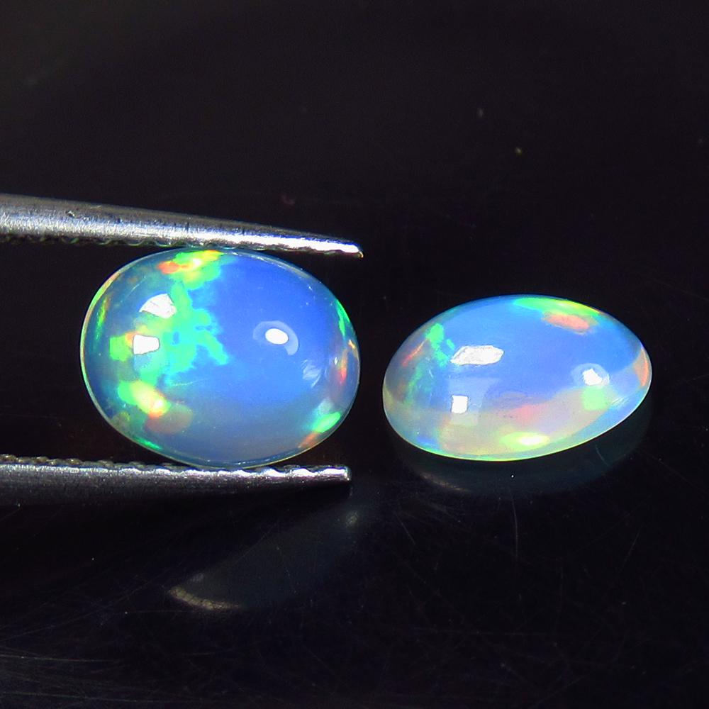 1.22 Ct Natural Ethiopian Multicolor Opal Oval Pair (1 of 2)