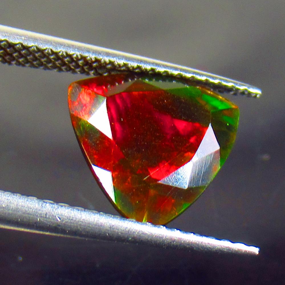 2.02 Ct Natural Black Fire Opal Trillion Cut (1 of 2)