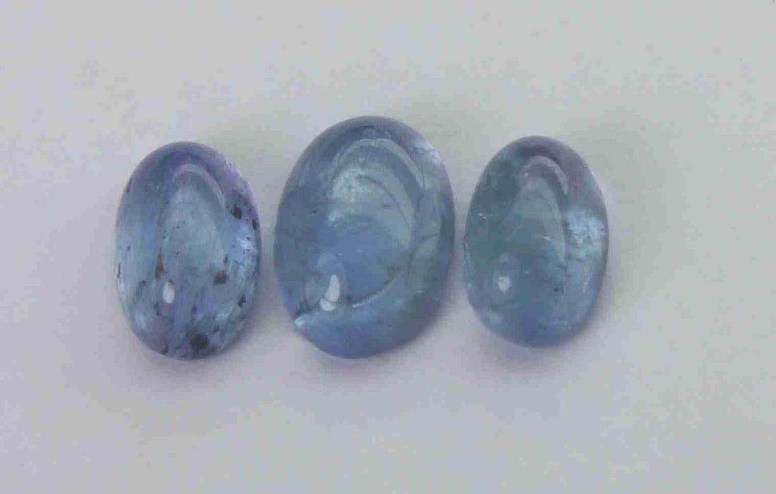 1.84 cts Natural Tanzanite Lot: No Reserve! Gemstone : Natural Tanzanite Shape and cut : Oval cabochan Weight : 1.84 Carats Measurements : 6.56x4.58x2.57 mm , 5.95x3.80x2.65 mm , 5.63x3.69x2.75 mm Number of Stone : 3 Color : voilite