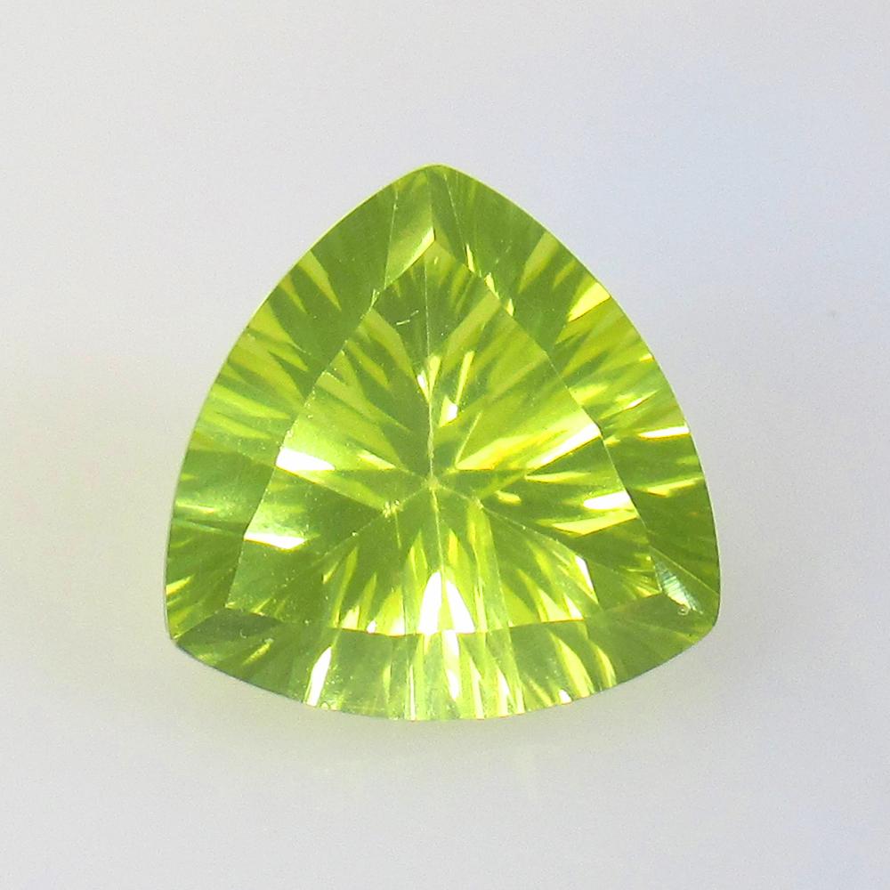 5.42 Ctw Natural Lemon Quartz Trillion Concave Cut: No Reserve! Title: 5.42 Ctw Natural Lemon Quartz Trillion Concave Cut Stone Clarity: VVS Gemstones: Lemon Quartz Carat Weights: 5.42 Size/Dimensions: 12.00 x 12.00 x 7.80 mm Additional Information: Ex