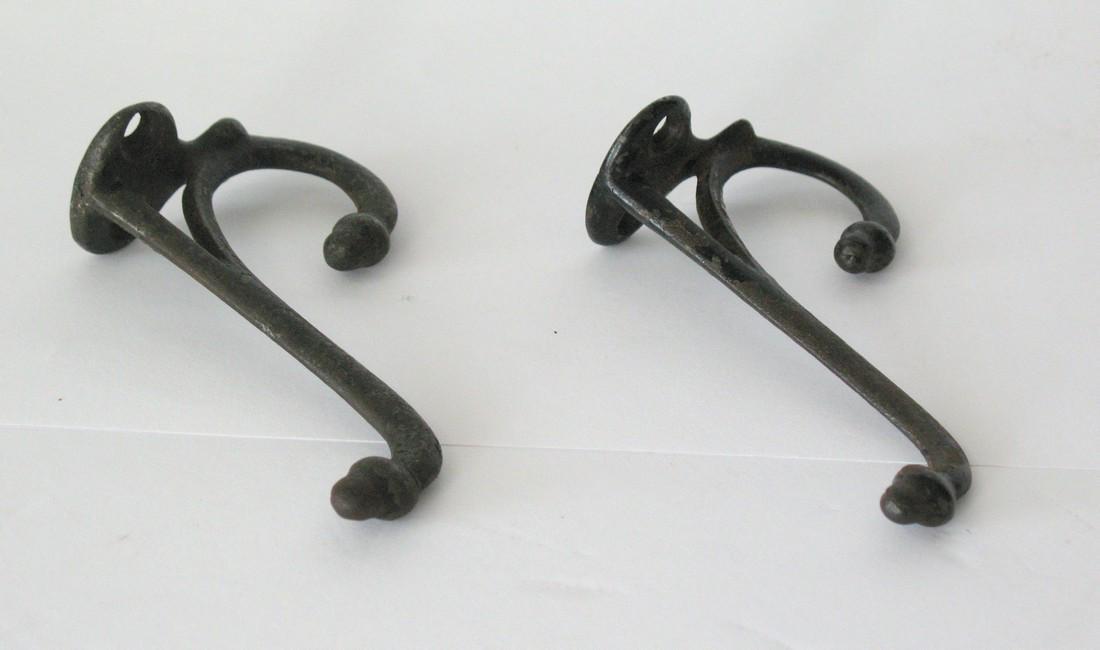 Vintage pair of cast iron coat hooks. (1 of 1)