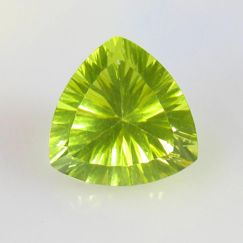 5.26 Ctw Natural Lemon Quartz Trillion Cut: Title: 5.26 Ctw Natural Lemon Quartz Trillion Cut Stone Clarity: VVS Gemstone:Lemon Quartz Carat Weights: 5.26 Size/Dimensions: 12.00 x 12.00 x 8.00 mm Additional Info:Excellent Trillion cut / Good Lu