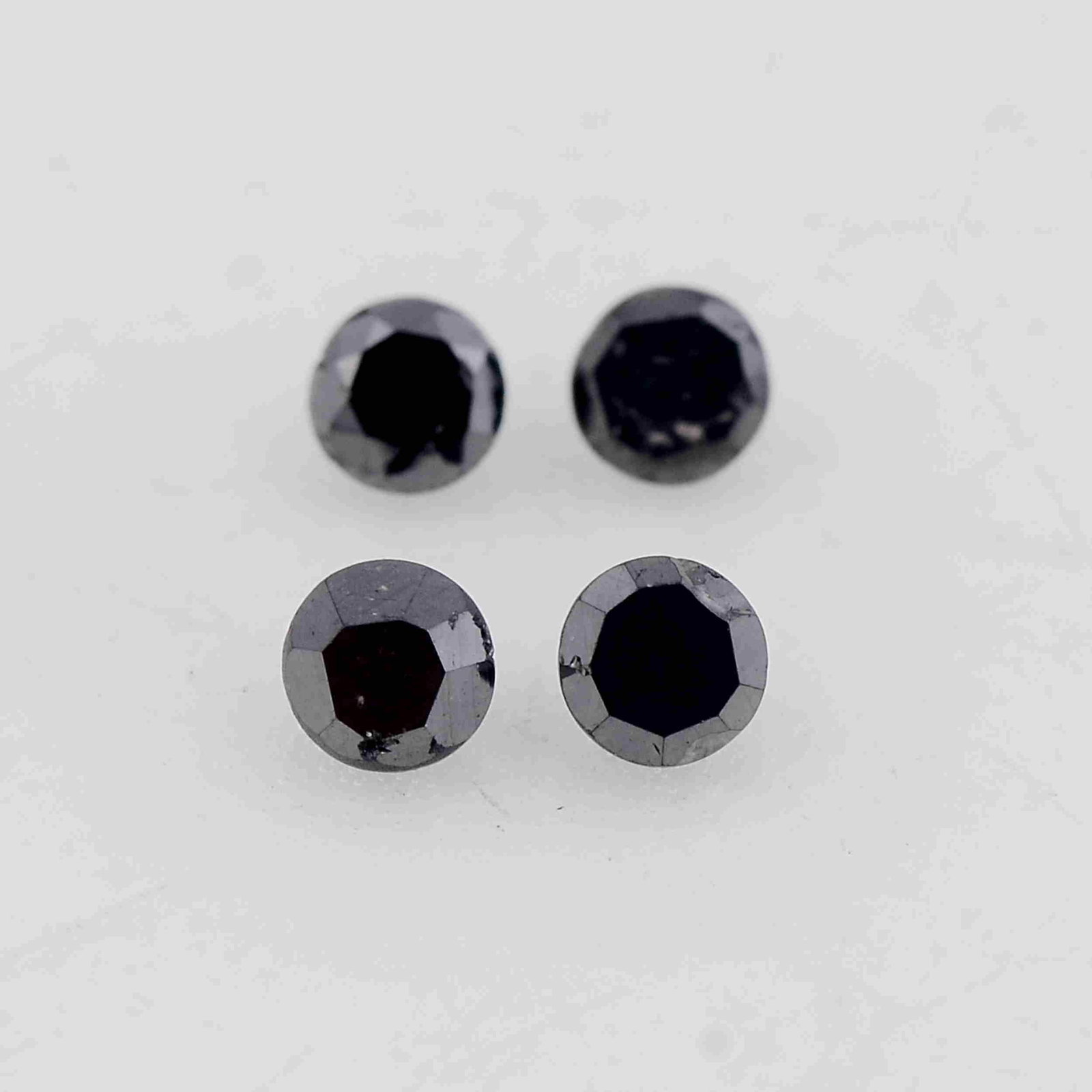 0.05 Carat Fancy Black Color Natural Round Diamond: No Reserve! Title: 0.05 Carat Fancy Black Color Natural Round Diamond Loose Gemstone 4 Pieces Brand: Gems Trading Center Gemstones: Diamond Carat Weights: 0.052 Size/Dimensions: 1.5L x 1W mm Shipping: