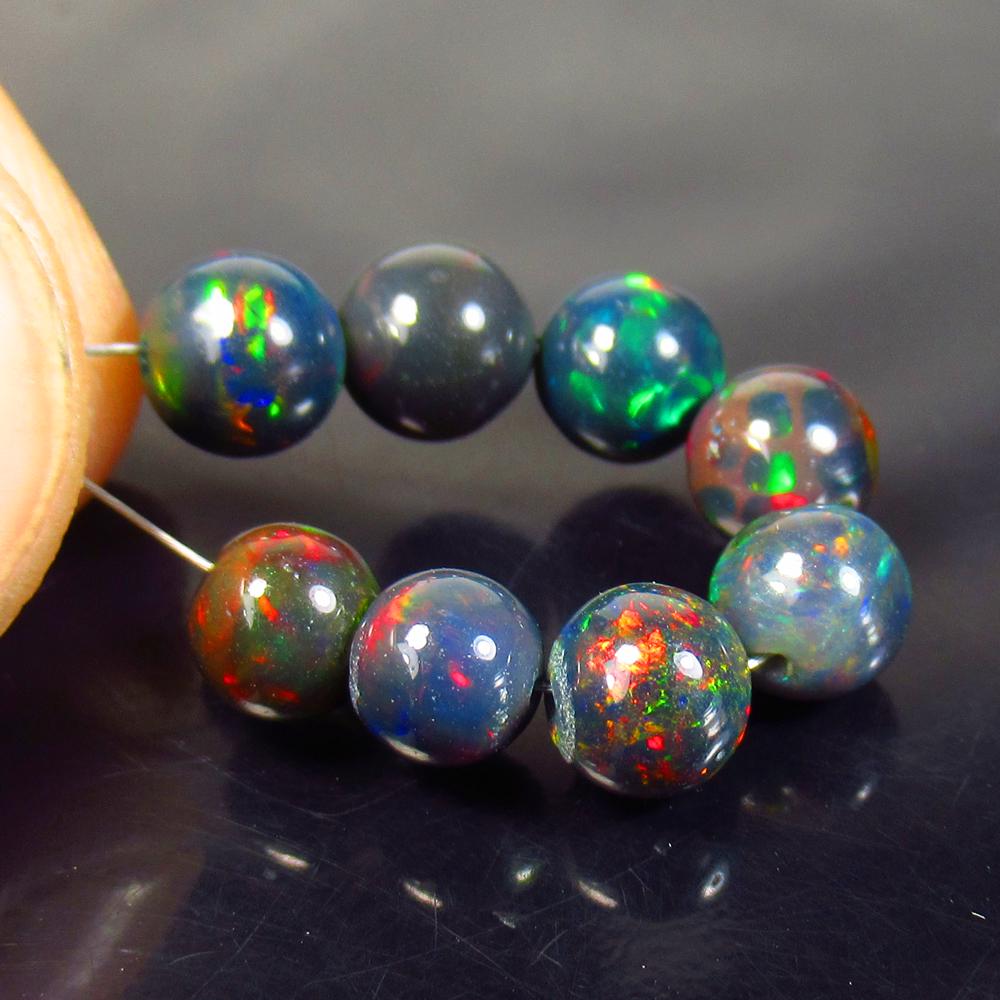 5.94 Ct Natural 8 Drilled Black Fire Opal Ball Beads (1 of 2)