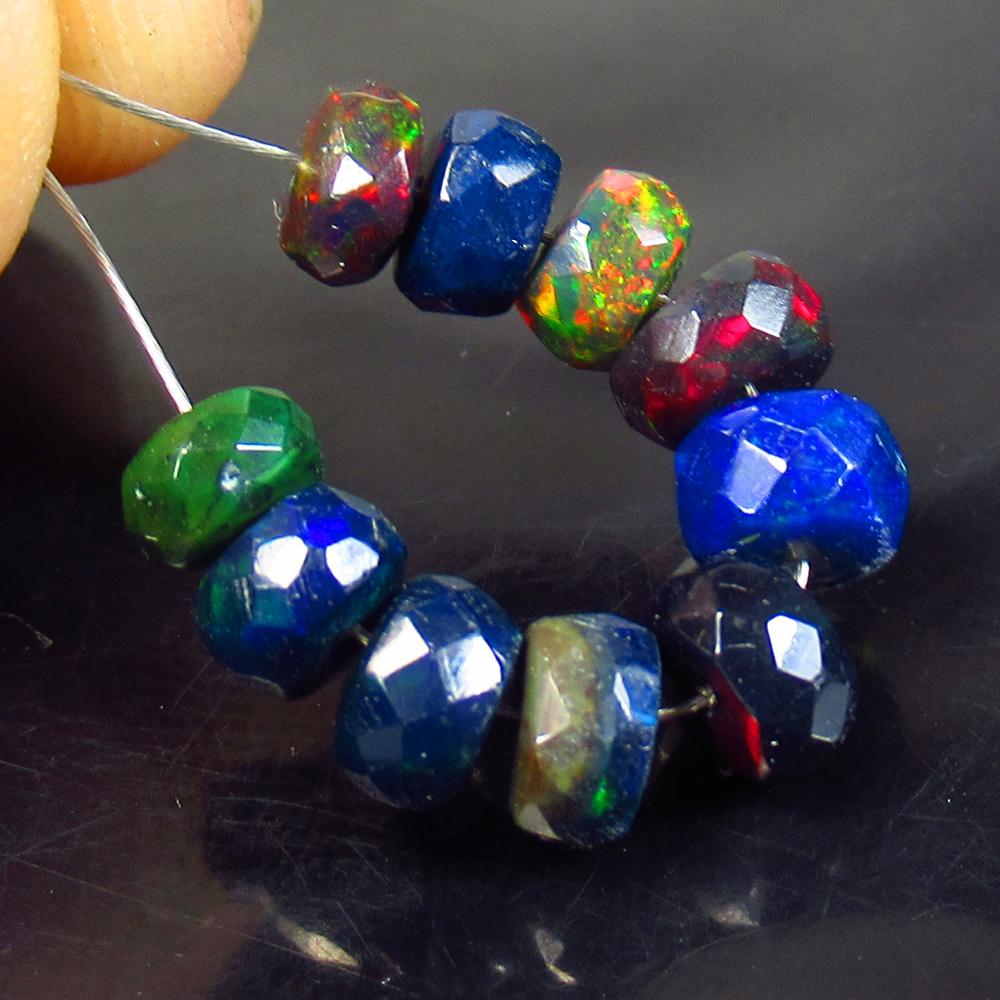 5.33 Ct Natural 10 Drilled Black Faceted Fire Opal: No Reserve! Title: 5.33 Ct Natural 10 Drilled Black Faceted Fire Opal Beads Stone Clarity: Translucent Gemstone: Natural Faceted BlackOpal Beads Carat Weights: 5.33 Size/Dimensions: 5.10 to 5.80 mm / 