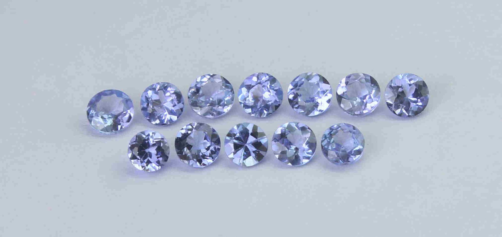 0.89 Cts Natural Tanzanite: No Reserve! Title: 0.89 Cts Natural Tanzanite Additional Information: Gemstone : Natural Tanzanite Shape and cut : Round Cut Weight : 0.89 Carats Measurements : 2.5x2.5 mm Number Of Stone : 12 Color :