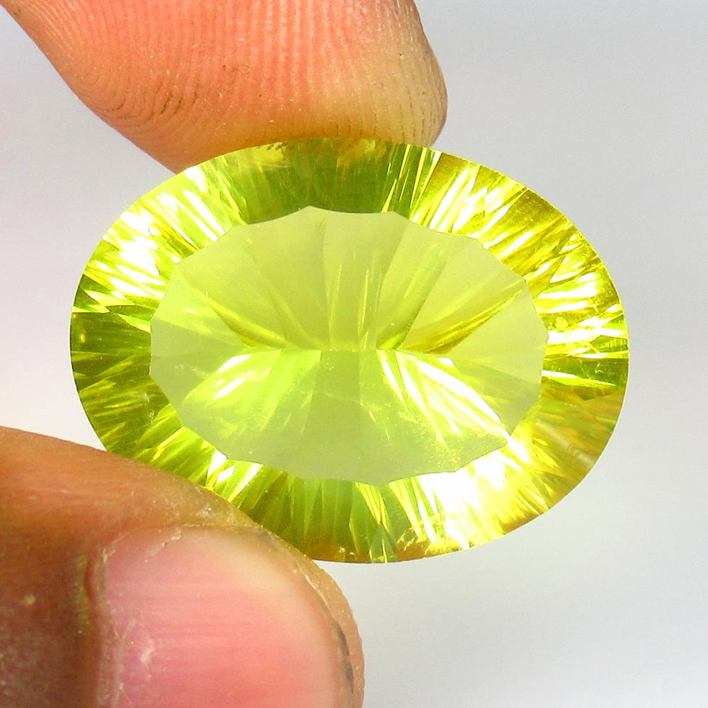 20.70 Ctw Natural Lemon Quartz Concave Cut: No Reserve! Title: 20.70 Ctw Natural Lemon Quartz Concave Cut Stone Clarity: VVS Gemstones: Natural Lemon Quartz Carat Weights: 20.7 Size/Dimensions: 24.00 x 16.80 x 10.20 mm Additional Information: G