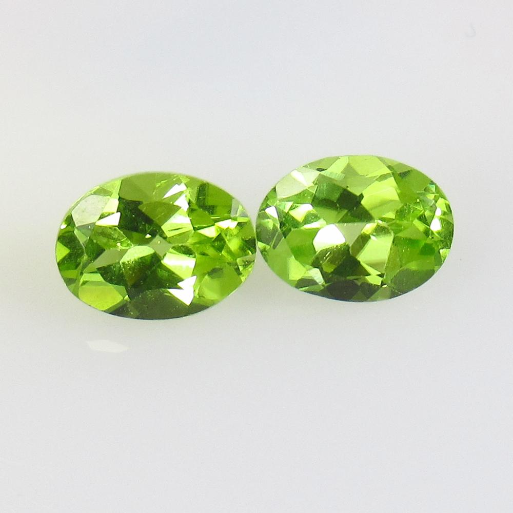 2.45 Ctw Natural Pakistan Peridot Oval Pair: No Reserve! Title: 2.45 Ctw Natural Pakistan Peridot Oval Pair Stone Clarity: VVS Gemstones: Peridot Carat Weights: 2.45 Size/Dimensions: 7.90 x 5.90 x 4.00 mm / 2 PC's Additional Information: Top Cla