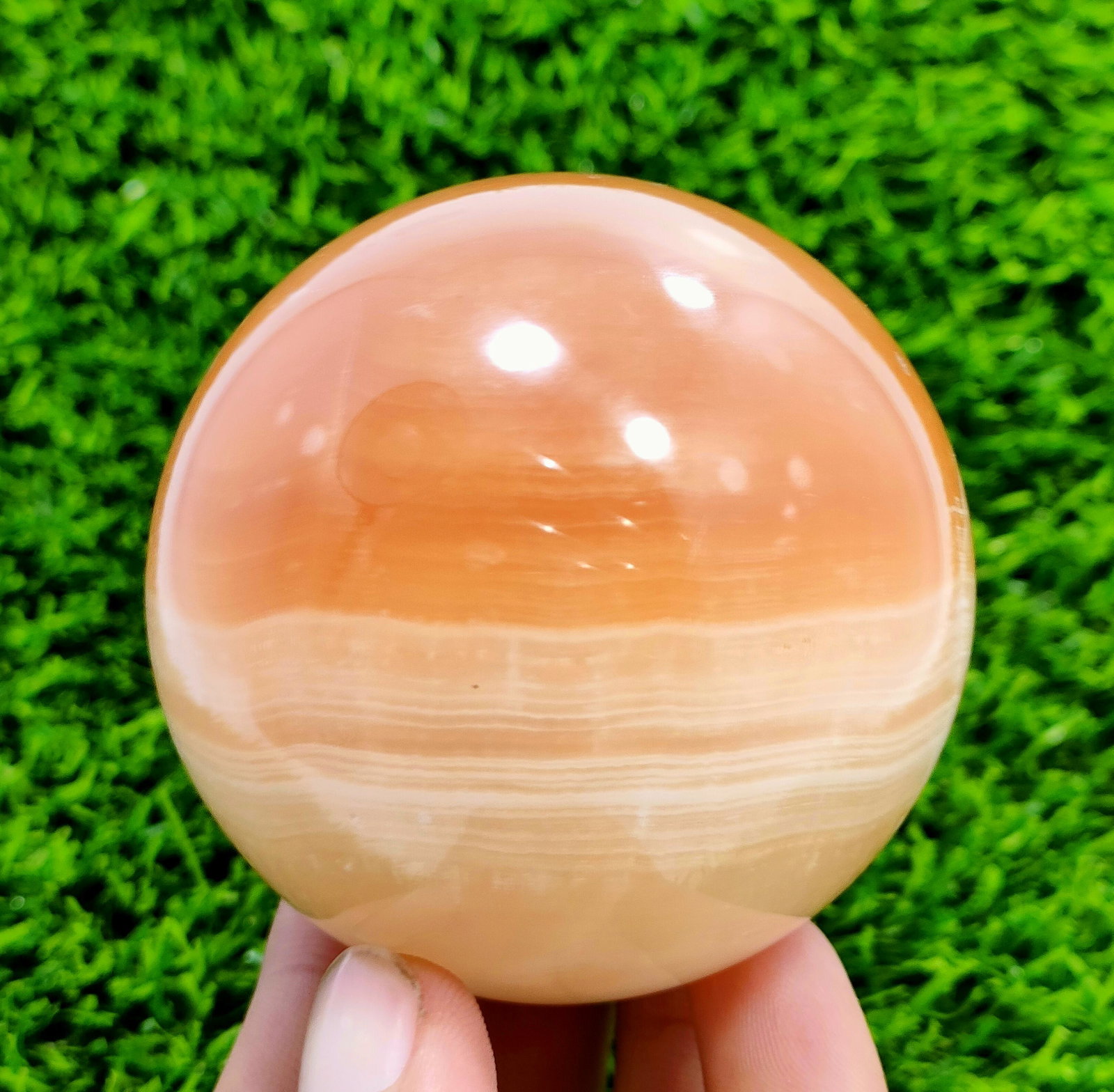 1797 CTs Stunning Hand Made Calcite Healing Sphere: Title: 1797 CTs Stunning Hand Made Calcite Healing Sphere Treatment: Natural Carat Weights: 1797 Carats Size/Dimensions: 62 mm Origin: Pakistan Reserve: $23.00 Shipping: Domestic: Flat-rate of $15