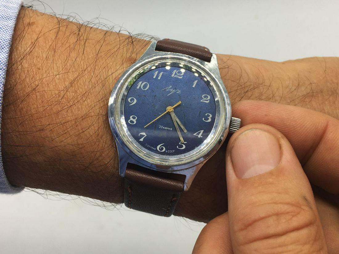 Luch vintage men wrist watch / Russian antique unisex: Materials Band material: Leather Gold, Stainless steel Luch vintage men wrist watch. Russian antique unisex white USSR watches. Mens watch. Vintage watch. Military watch. Mens Wrist Watch. Watches for