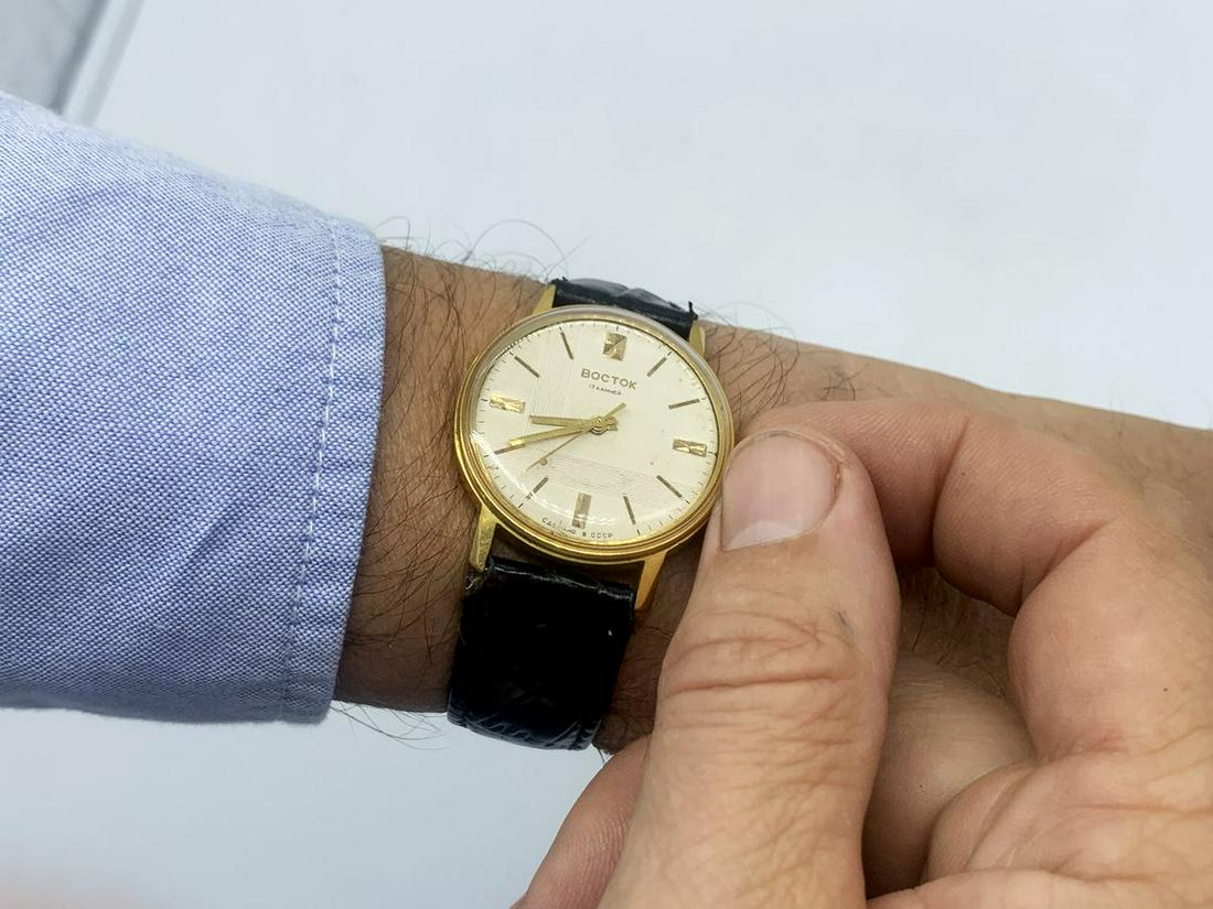 Vostok vintage men wrist watch / Russian antique unisex: Materials Band material: Leather Gold, Stainless steel Vostok vintage men wrist watch. Russian antique unisex white USSR watches. Mens watch. Vintage watch. Military watch. Mens Wrist Watch. Watches f