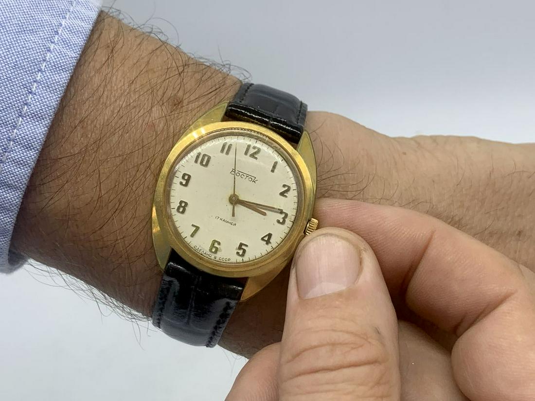 Vostok vintage men wrist watch / Russian antique unisex: Materials Band material: Leather Gold, Stainless steel Vostok vintage men wrist watch. Russian antique unisex white USSR watches. Mens watch. Vintage watch. Military watch. Mens Wrist Watch. Watches f