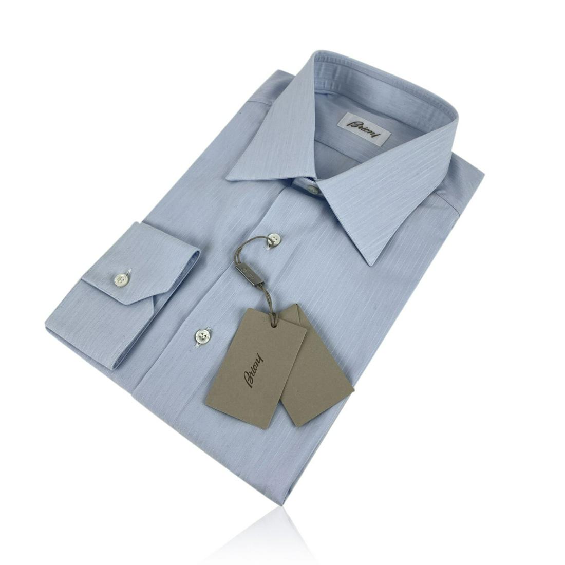 Brioni Light Blue Long Sleeve Men Button Down Shirt: Brioni men button down shirt. It features long sleeve styling and pointed collar. Made in Italy. Size 43-17 - 54 IT Details MATERIAL: Cotton COLOR: Blue MODEL: - GENDER: Gentlemen COUNTRY OF MANUFACTU