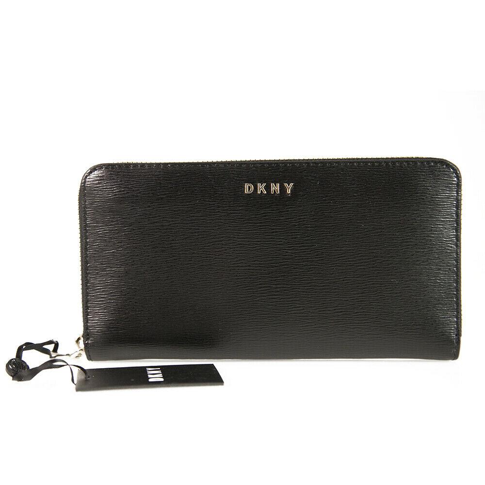 DKNY Donna Karan Bryant - New Black Leather Zip Around: DKNY Donna Karan Bryant - New Black Leather Zip Around Wallet New Organization goes ultra-chic with the beautifully sleek DKNY Bryant New Zip-Around Wallet. A beautiful clutch wallet that is ideal for
