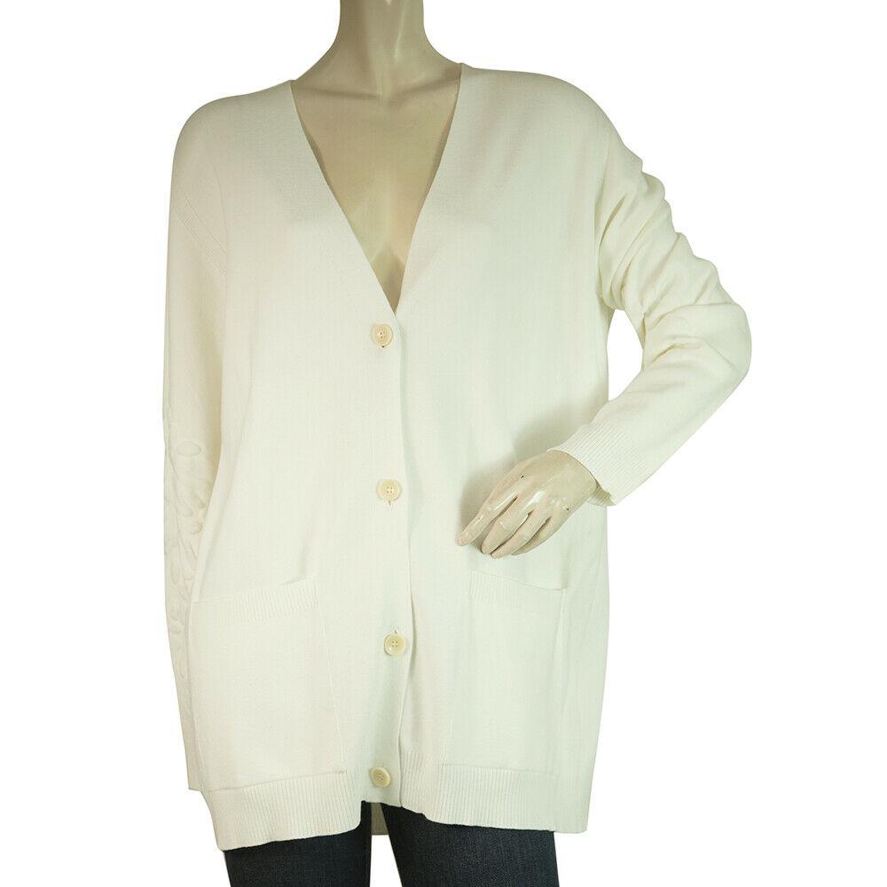 Escada White Knit Floral Jacquard Detail Long Cardi: Escada White Knit Floral Jacquard Detail Long Cardi Cardigan size L The most stylish cardigan that will keep you warm in a chilly day is this white Escada knitted beauty. It features button front clos
