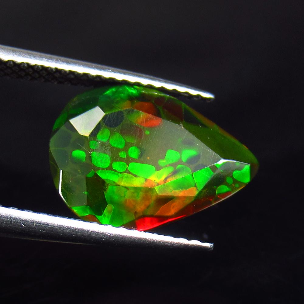 2.53 Ctw Natural Ethiopian Black Fire Opal Pear Cut: No Reserve! Title: 2.53 Ctw Natural Ethiopian Black Fire Opal Pear Cut Stone Clarity: Translucent Gemstone: Black Opal Carat Weights: 2.53 Size/ Dimensions: 13.20 x 10.30 x 5.60 mm Additional Info: Ex