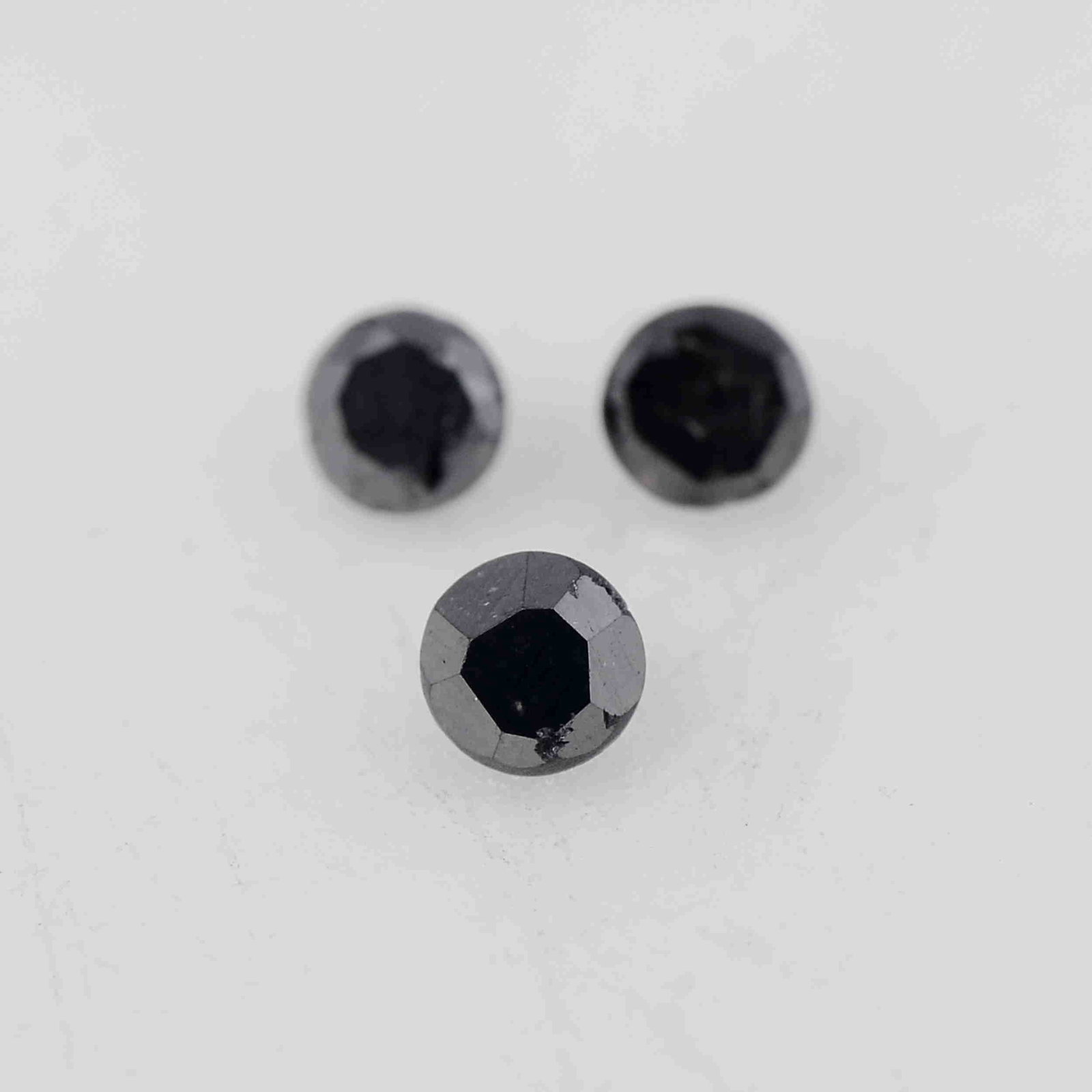 0.04 Carat Fancy Black Color Natural Round Diamond: No Reserve! Title: 0.04 Carat Fancy Black Color Natural Round Diamond Loose Gemstone 3 Pieces Brand: Gems Trading Center Gemstones: Diamond Carat Weights: 0.039 Size/Dimensions: 1.5L x1.5W mm Shipping