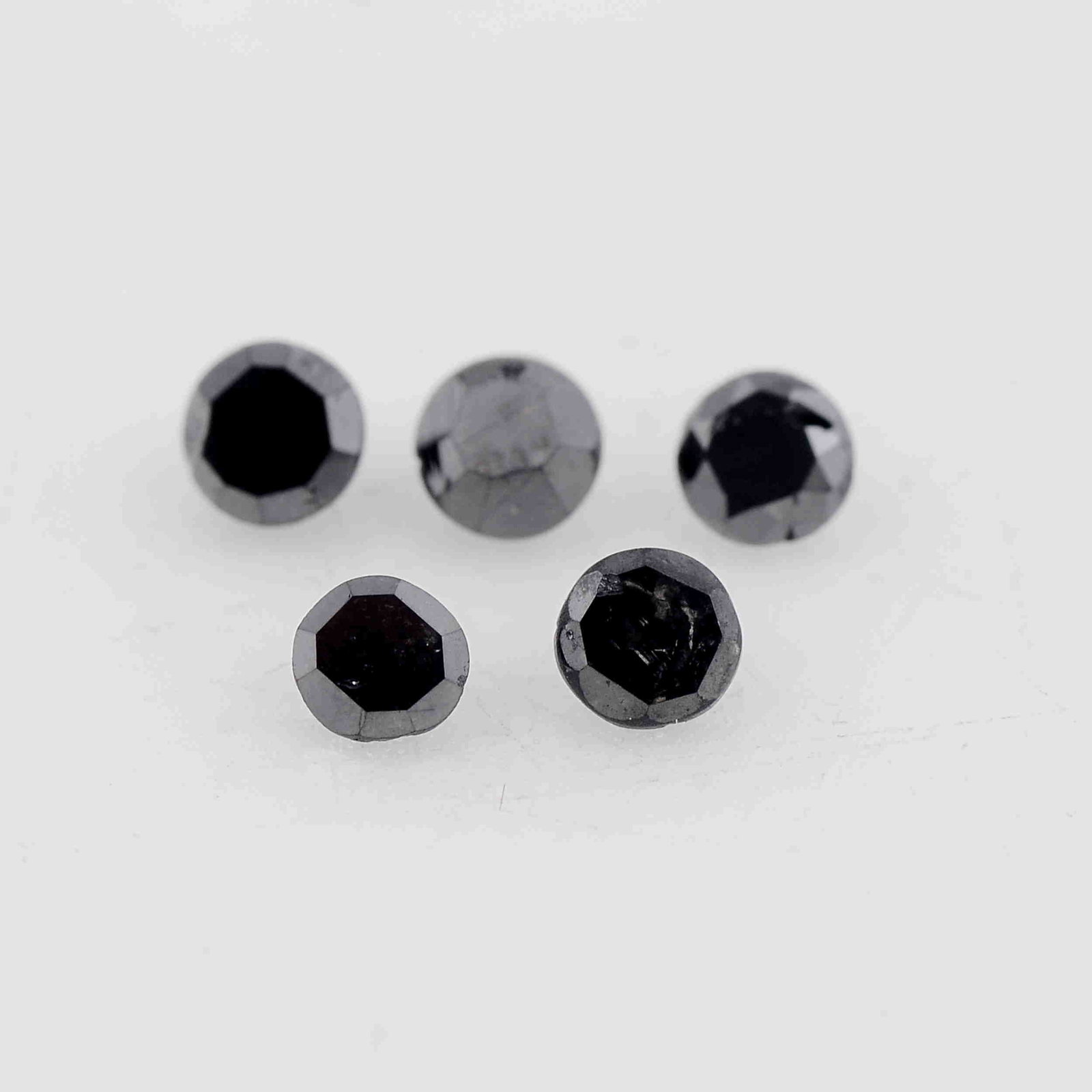 0.07 Carat Fancy Black Color Natural Round Diamond: No Reserve! Title: 0.07 Carat Fancy Black Color Natural Round Diamond Loose Gemstone 5 Pieces Additional Information: Specification of Gemstone * Stone : Diamond * Shape : Round * Size : 1.5L x 1.5W m