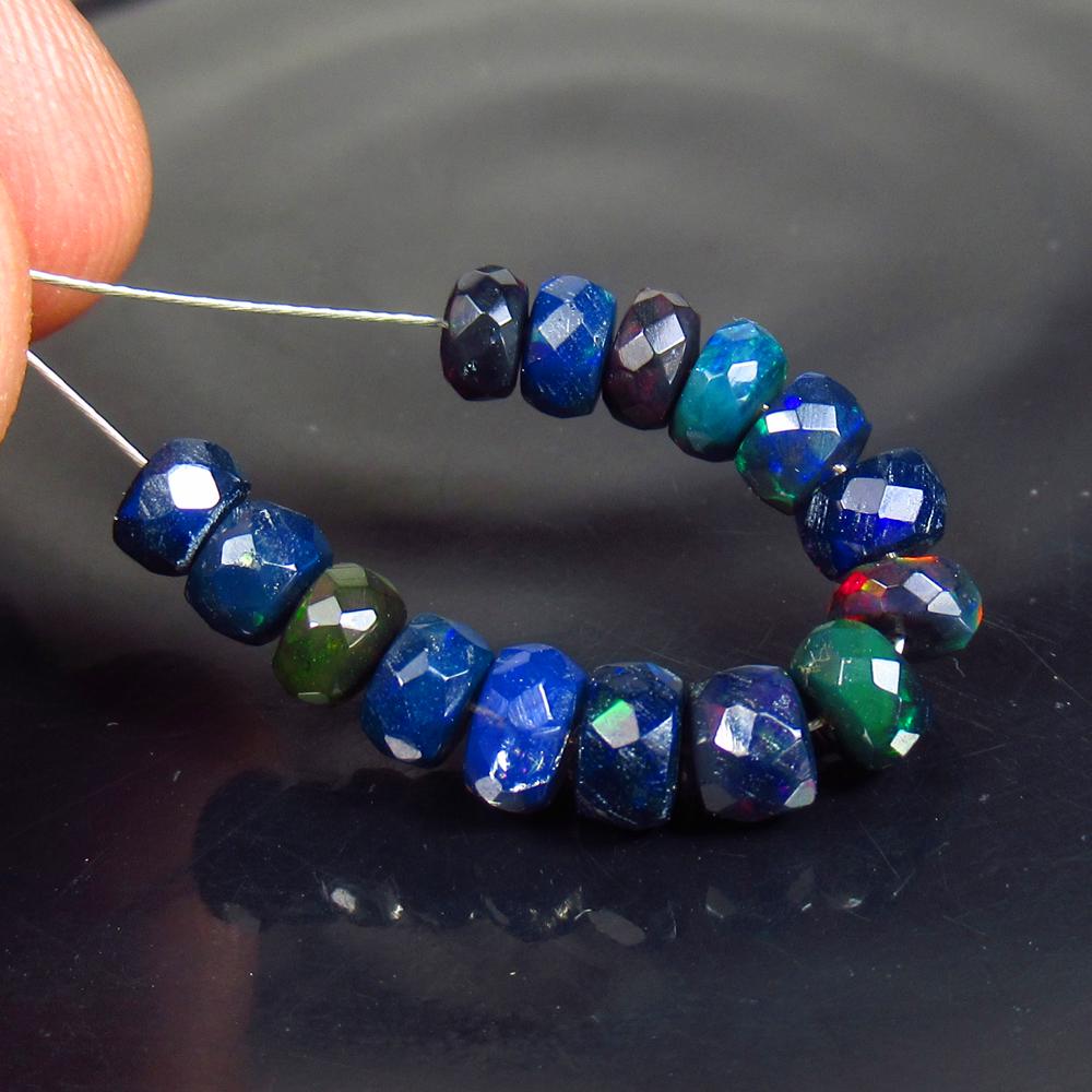 5.93 Ctw Natural 15 Drilled Faceted Black Opal Beads: No Reserve! Title: 5.93 Ctw Natural 15 Drilled Faceted Black Opal Beads Stone Clarity: Translucent Gemstones: Faceted Black Opal Beads Carat Weights: 5.93 Size/Dimensions: 4.50 - 5.40 mm / 15 Pcs Addi