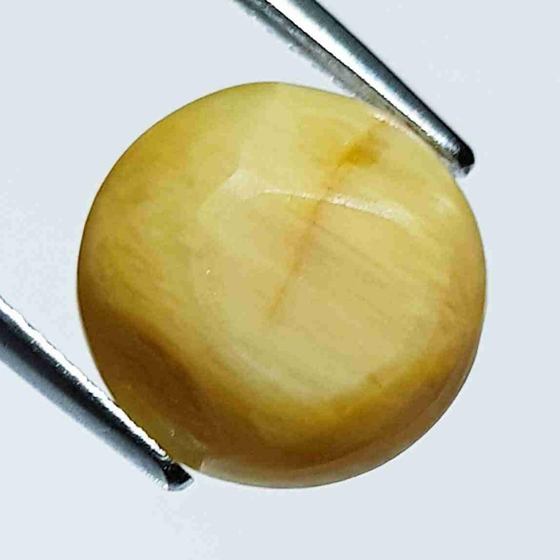 6.23 ct Natural Opal Cat's Eye: No Reserve! Title: 6.23 ct Natural Opal Cat's Eye Color/Clarity: Semi Transparent Gemstones: Loosegemstone Carat Weights: 6.23 Size/Dimensions: 12.20 x 12.00 x 7.10 Additional Information: Round - Afr