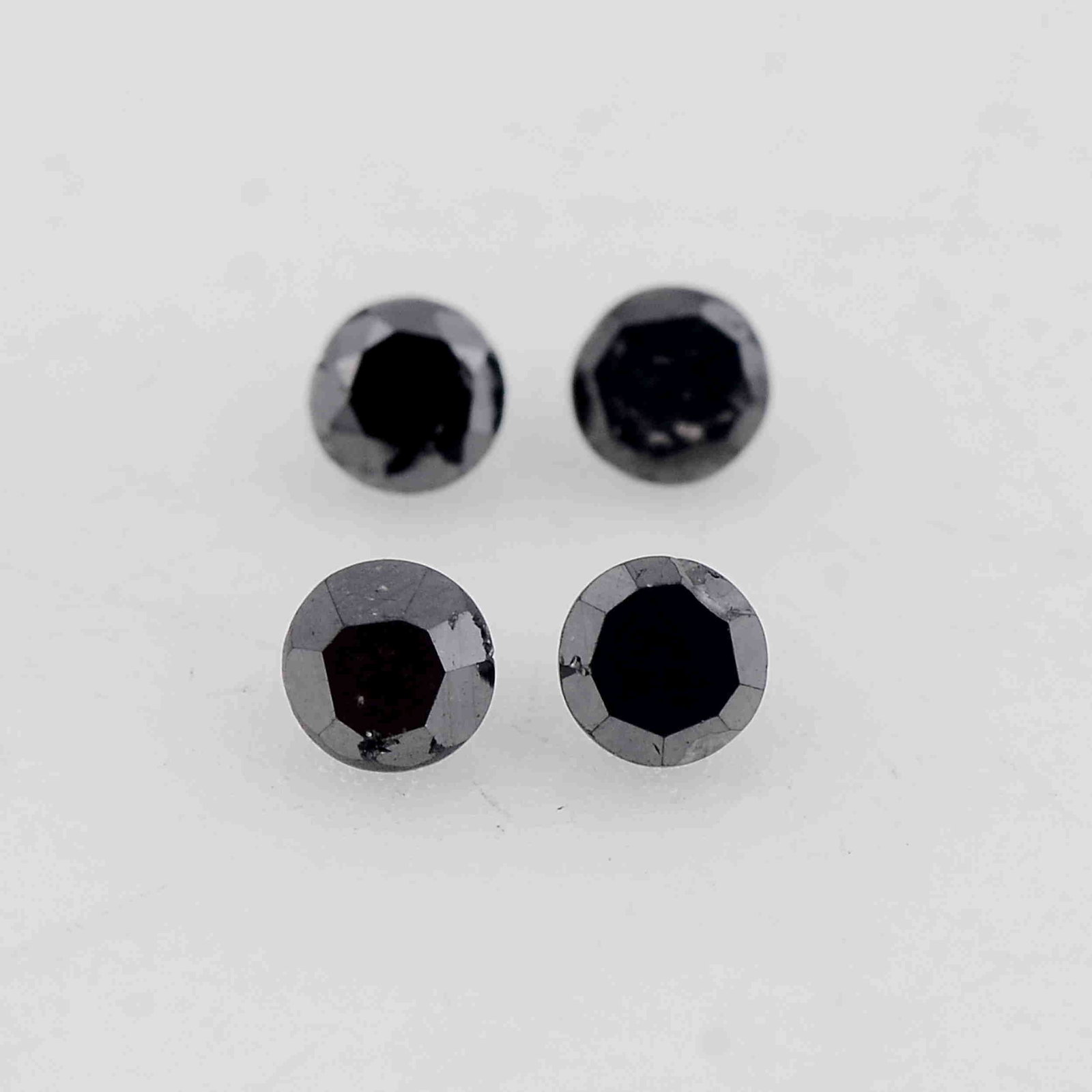 0.05 Carat Fancy Black Color Natural Round Diamond: No Reserve! Title: 0.05 Carat Fancy Black Color Natural Round Diamond Loose Gemstone 4 Pieces Additional Information: Specification of Gemstone * Stone : Diamond * Shape : Round * Size : 1.5L x 1.5W m