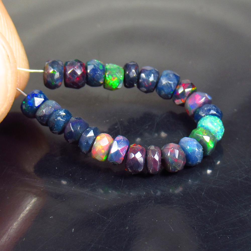 5.23 Ctw Natural 23 Drilled Faceted Black Opal Beads: No Reserve! Title: 5.23 Ctw Natural 23 Drilled Faceted Black Opal Beads Stone Clarity: Translucent Gemstones: Faceted Black Opal Beads Carat Weights: 5.23 Size/Dimensions: 3.60 - 4.50 mm / 23 Pcs Addi