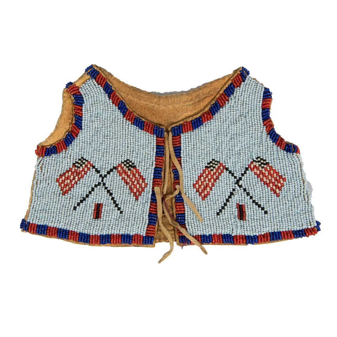Plains beaded infant?s vest, mid to late 20th century, (1 of 2)