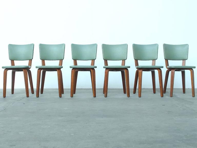 Rare Set of Six Plywood Dining Chairs by Cor Alons for: Beautiful early mid-century Dutch design dining chairs by Cor Alons manufactured by furniture factory Gouda Den Boer Holland, circa 1949. The chairs are made of laminated birchwood and are upholstered