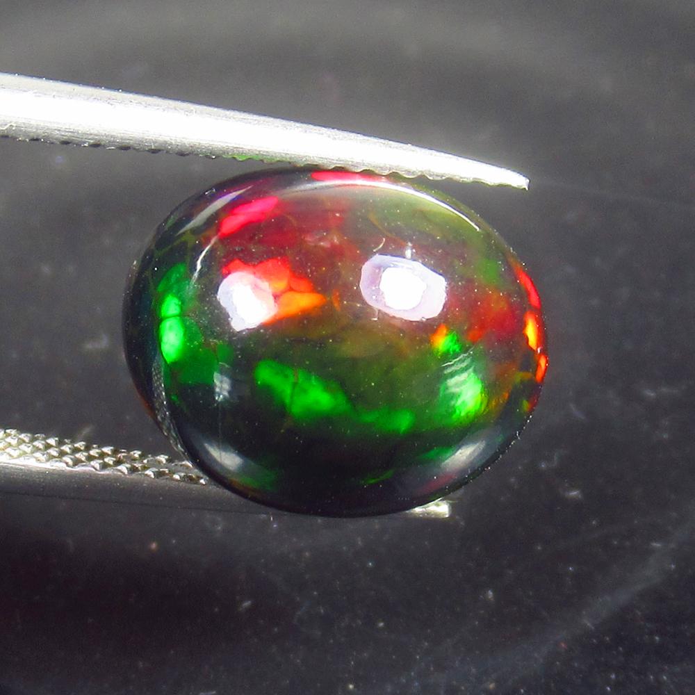 5.58 Ct Natural Ethiopian Black Fire Opal Oval Cab (1 of 3)