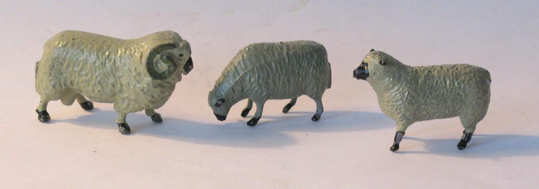 Group of three vintage cast metal sheep. (1 of 2)