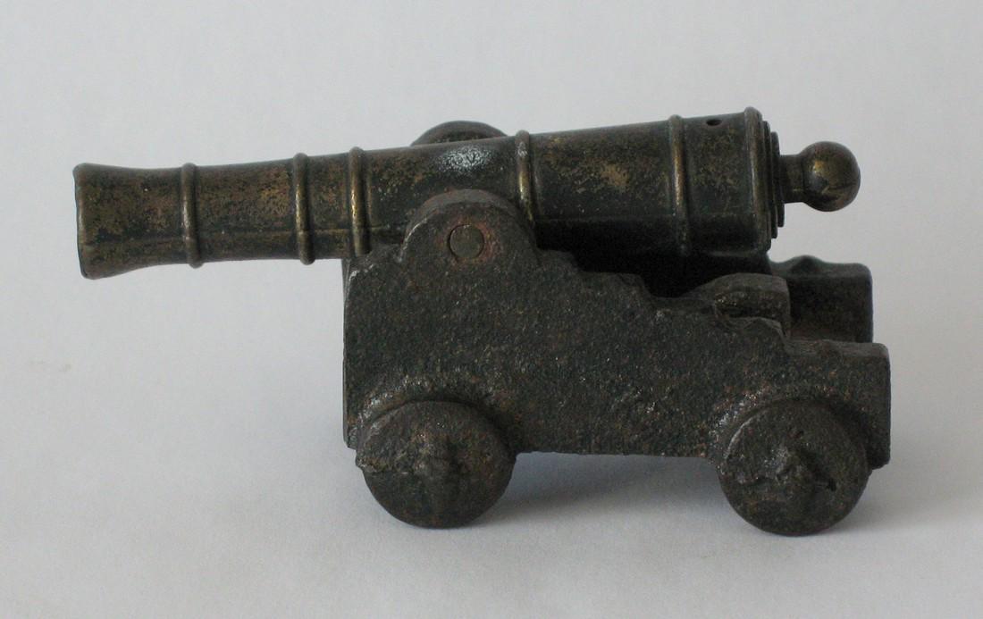 Vintage cast iron and brass canon paper weight. (1 of 2)