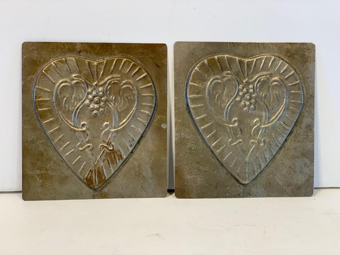 Heart motif Chocolate Mold, early 20th c: Title: Heart motif Chocolate Mold, early 20th c Date/Period: Early 20th c Dimension: 5 1/2 in. x 6 in. Additional Information: Grape & tendril motif. Nice patina. Shipping: Domestic: Flat-rate of $25.