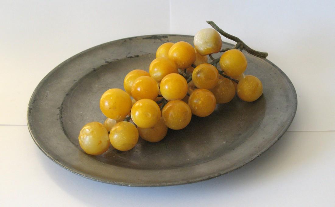 Vintage cluster of stone grapes. (1 of 1)