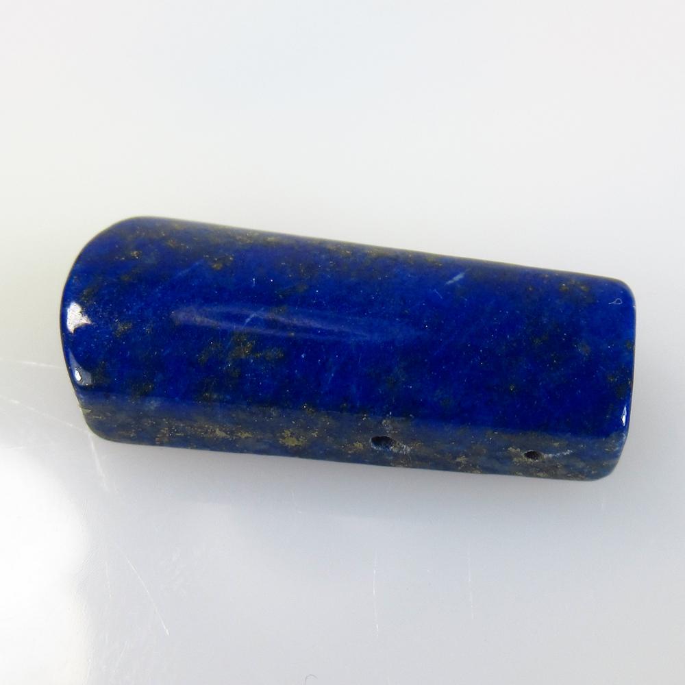 13.51 Ctw Natural Drilled Blue Lapis Lazuli Fancy Cab: No Reserve! Title: 13.51 Ctw Natural Drilled Blue Lapis Lazuli Fancy Cab Stone Clarity: Opaque Gemstone: Lapis Lazuli Carat Weights: 13.51 Size/ Dimensions: 23.00 x 9.90 x 5.20 mm Additional Info: Nic