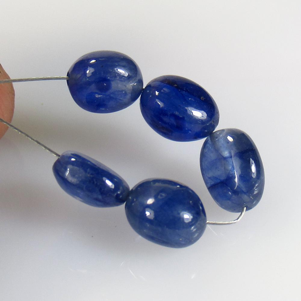 13.94 Ctw Natural 5 Drilled Tanzanite Dumble Beads: No Reserve! Title: 13.94 Ctw Natural 5 Drilled Tanzanite Dumble Beads Stone Clarity: Transparent Gemstone: Tanzanite Beads Carat Weights: 13.94 Size/ Dimensions: 7.5x6.5 - 8.3x6.3 mm / 5 PC's Addition