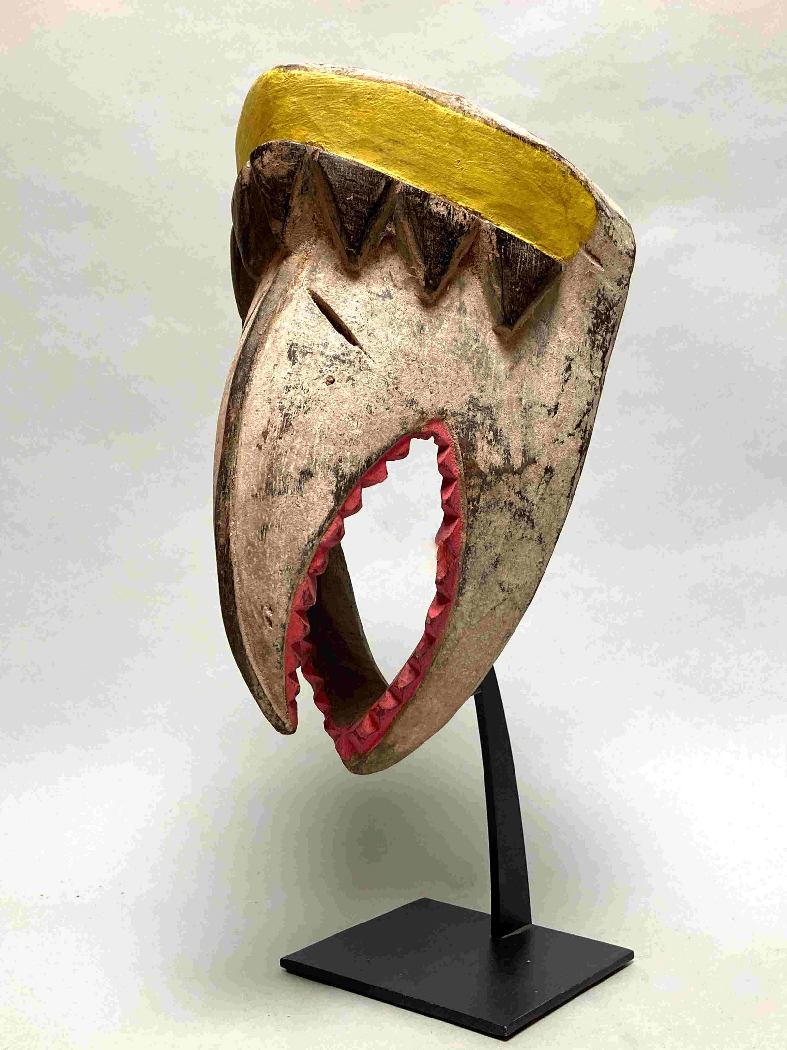 Bird beak mask, Gagon, Kran - Ivory coast: Face mask with elongated Bird beak , known as "Gagon" such masks were worn for funerals and judicial ceremonies. It is cut from one piece of wood and has beautiful geometric patterns. The minimalist m
