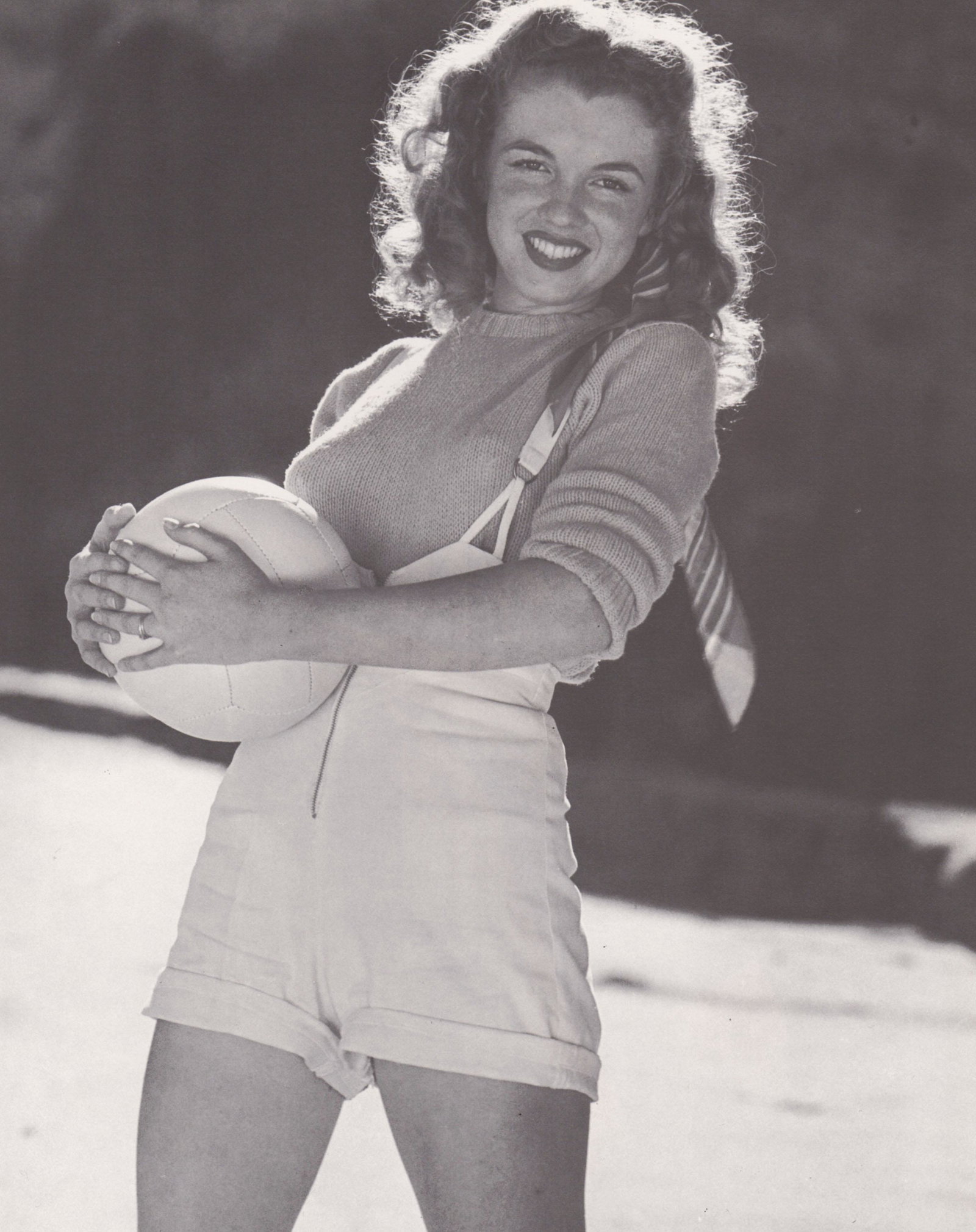 ANDRE DE DIENES -Marilyn Monroe ( Norma Jean) with ball: Artist: ANDRE DE DIENES Print Title: Marilyn Monroe ( Norma Jean) with ball Medium: Photo-lithograph Printed 1980’s in the USA Image size (inches) approx. 11.5 x 9” Andre De Dienes De Dien